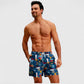 Men's Elastic Waist Swim Trunks with Colorblock Palm Tree Print and Adjustable Drawstring
