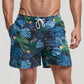 Men's Tropical Leaf Print Swim Trunks with Quick-Dry Fabric and Drawstring Waistband for Beach and Pool Comfort