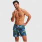 Men's Tropical Leaf Print Swim Trunks with Adjustable Drawstring and Side Pockets