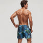 Men's Tropical Leaf Print Swim Trunks with Quick-Dry Fabric and Drawstring Waistband for Beach and Pool Comfort