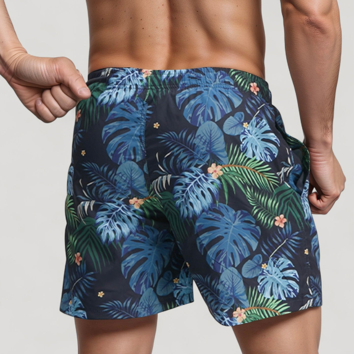 Men's Tropical Leaf Print Swim Trunks with Quick-Dry Fabric and Drawstring Waistband for Beach and Pool Comfort