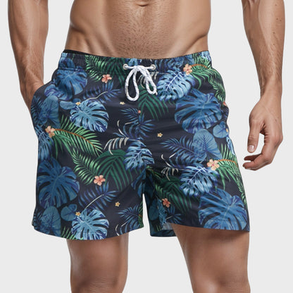 Men's Tropical Leaf Print Swim Trunks with Quick-Dry Fabric and Drawstring Waistband for Beach and Pool Comfort