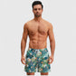 Men's Tropical Leaf Print Swim Trunks with Elastic Waistband and Mesh Lining