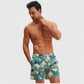 Men's Tropical Leaf Print Swim Trunks with Elastic Waistband and Mesh Lining