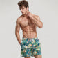 Men's Tropical Leaf and Floral Print Swim Trunks with Quick-Dry Fabric and Drawstring Waist for Vibrant Beach Style