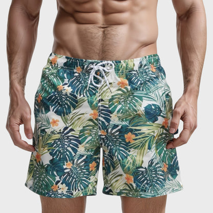 Men's Tropical Leaf and Floral Print Swim Trunks with Quick-Dry Fabric and Drawstring Waist for Vibrant Beach Style