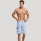 Men's Tropical Print Swim Trunks with Adjustable Drawstring Waist and Cargo Pocket Detail