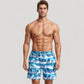Men's Tropical Leaf Print Swim Trunks with Adjustable Drawstring Waist and Quick-Dry Striped Fabric