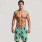 Men's Tropical Toucan Print Swim Trunks with Elastic Drawstring Waist and Quick-Dry Lightweight Fabric