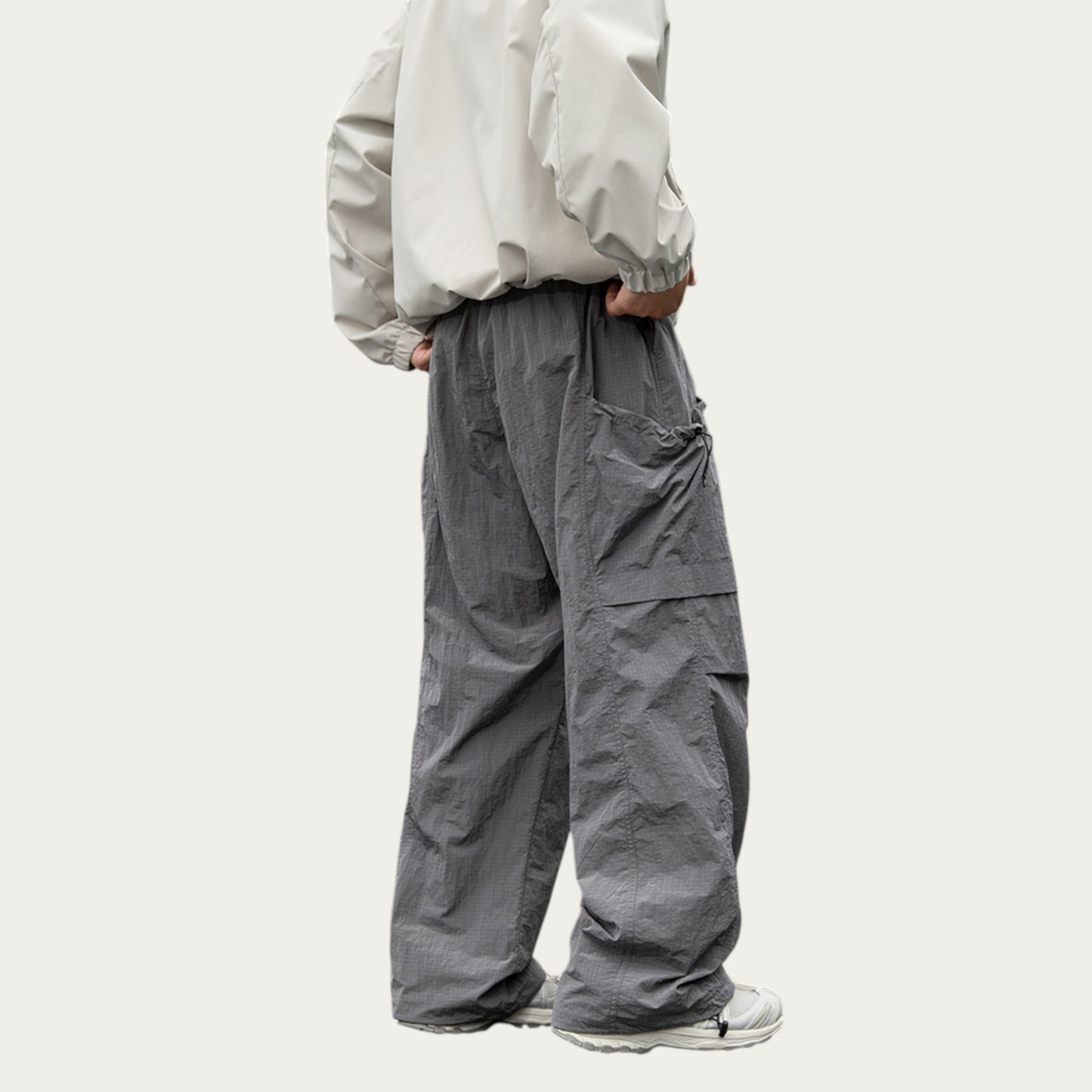 Men's Oversized Cargo Pants with Adjustable Drawstring Hem and Multi-Pocket Design