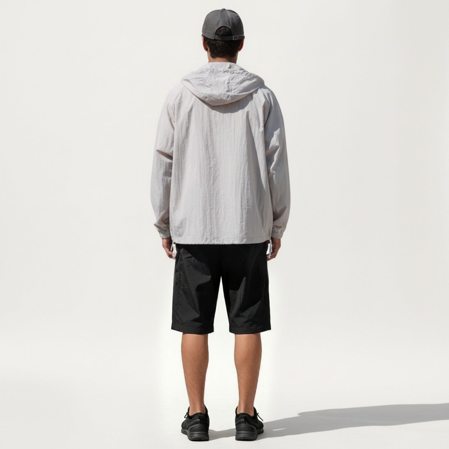Men's Lightweight Hooded Windbreaker Jacket with Full Zip Closure Elastic Cuffs and Relaxed Fit