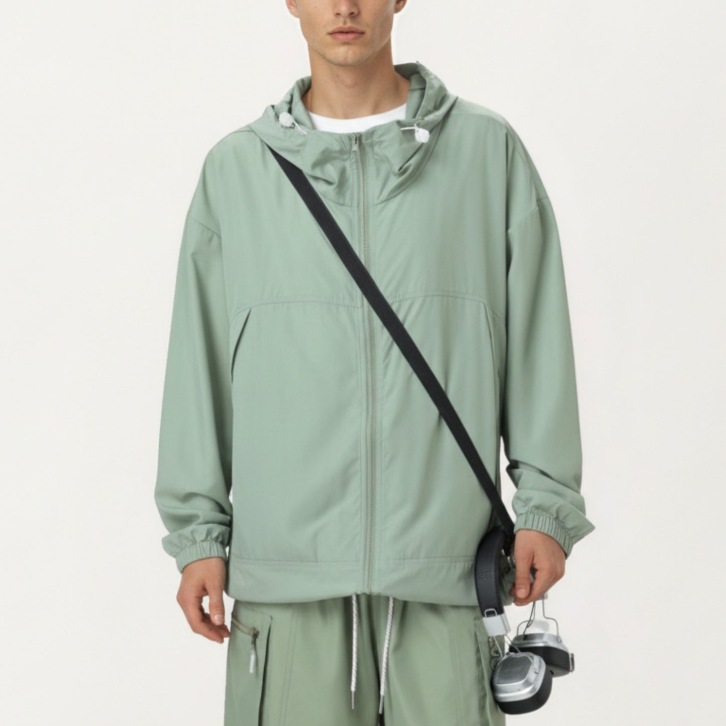 Men's Lightweight Hooded Windbreaker Jacket with Full Zip Closure Elastic Cuffs and Adjustable Hem
