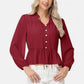 Long Sleeve Button Front Peplum Blouse with V-Neckline and Gathered Waist Detail