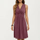 Sleeveless V Neck Midi Dress with Front Twist Detail and Flowy A Line Silhouette