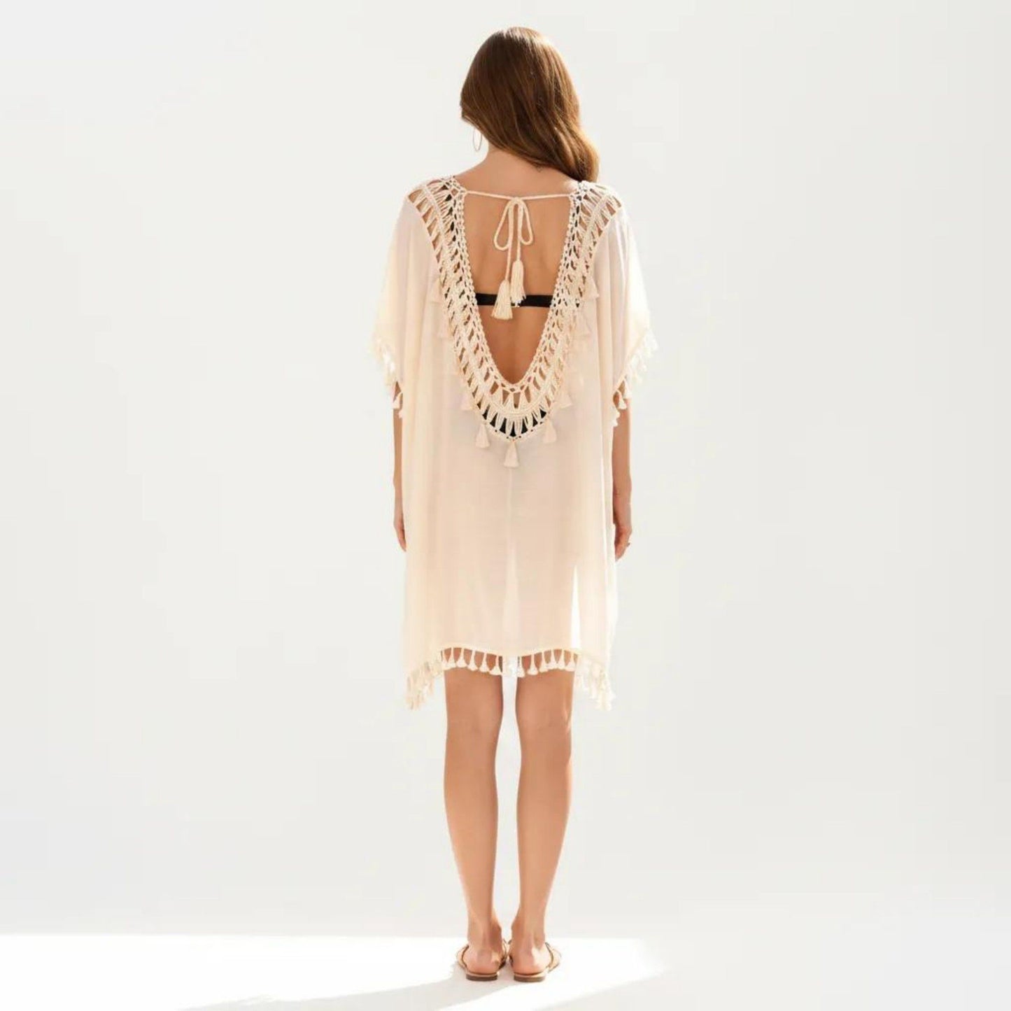 Sheer Crochet V Neck Swim Cover Up Poncho with Tassel Trim and Flowy Silhouette
