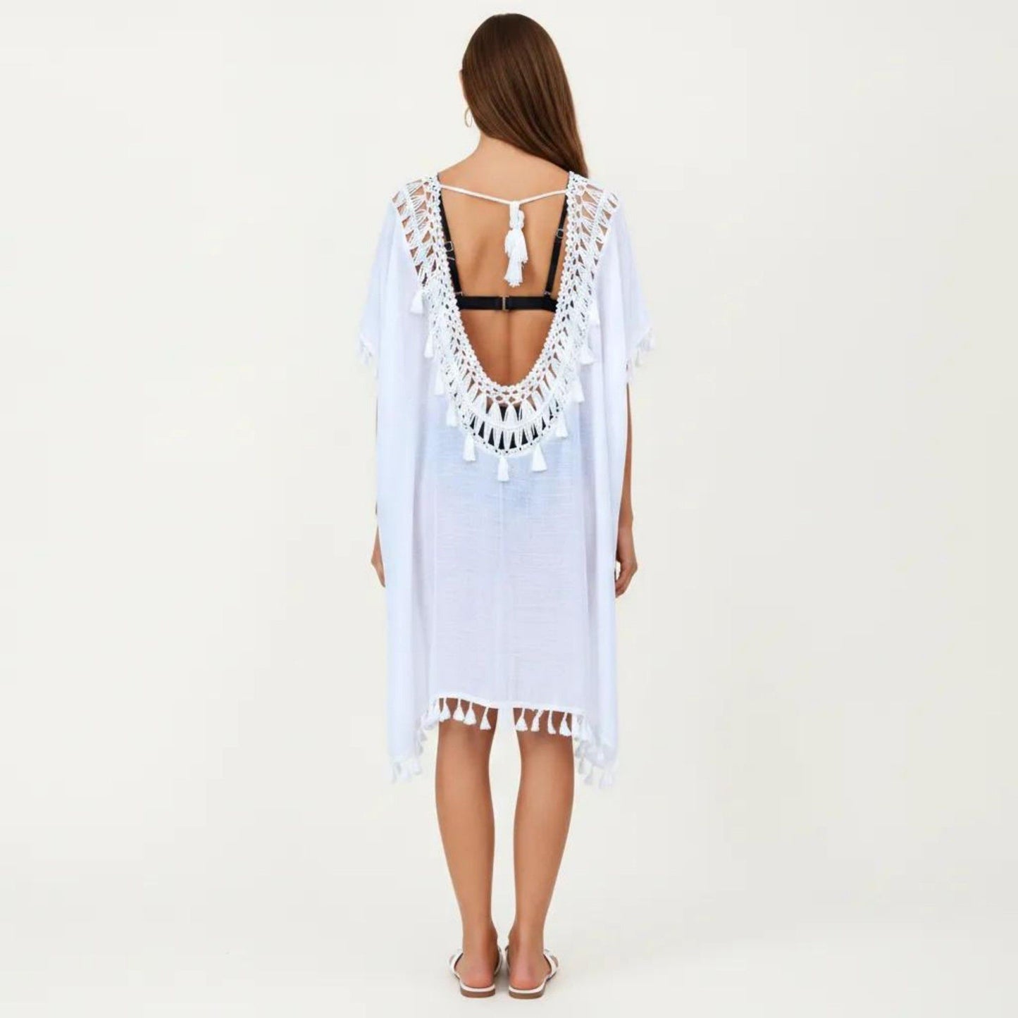 Sheer Crochet V Neck Swim Cover Up Poncho with Tassel Trim and Flowy Silhouette