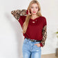 Crisscross V-Neck Top with Leopard Print Sleeves