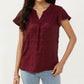 Short Sleeve Swiss Dot Top with Split Neckline and Soft Textured Fabric