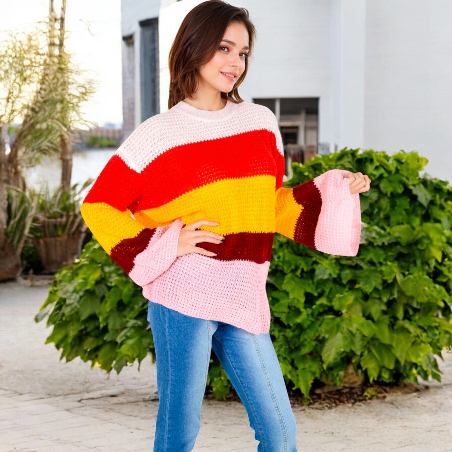 Striped Knit Sweater with Bell Sleeves and Colorful Details