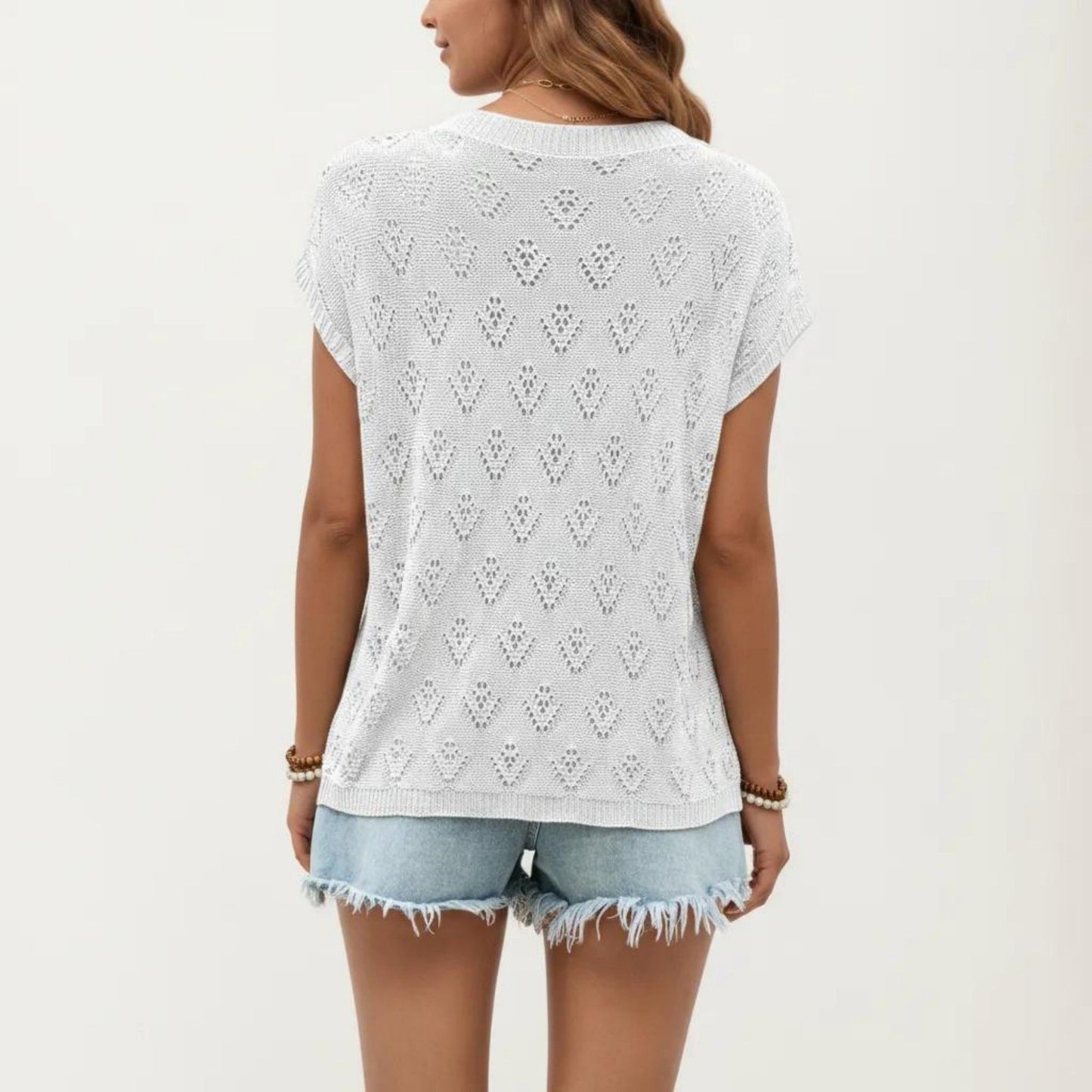 Short Sleeve Knit Top with Floral Eyelet Pattern and Ribbed Crew Neck