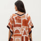Abstract Print Maxi Caftan Dress with V-Neckline Short Sleeves and Relaxed Draped Silhouette