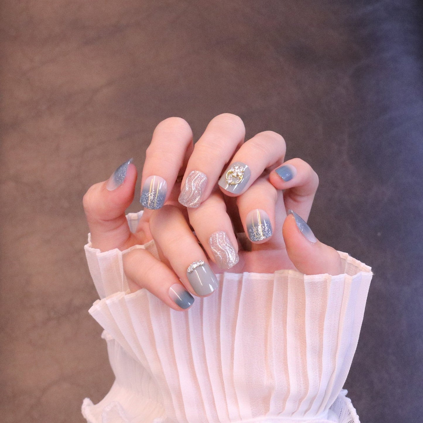 Short Squared Oval Light Blue Press On Nails with Waves and Crystals