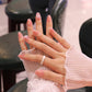 Medium Rounded Light Pink Press On Nails with Ruched Charm and Pearls