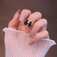 Medium Rounded Nude Press On Nails with Black Bow