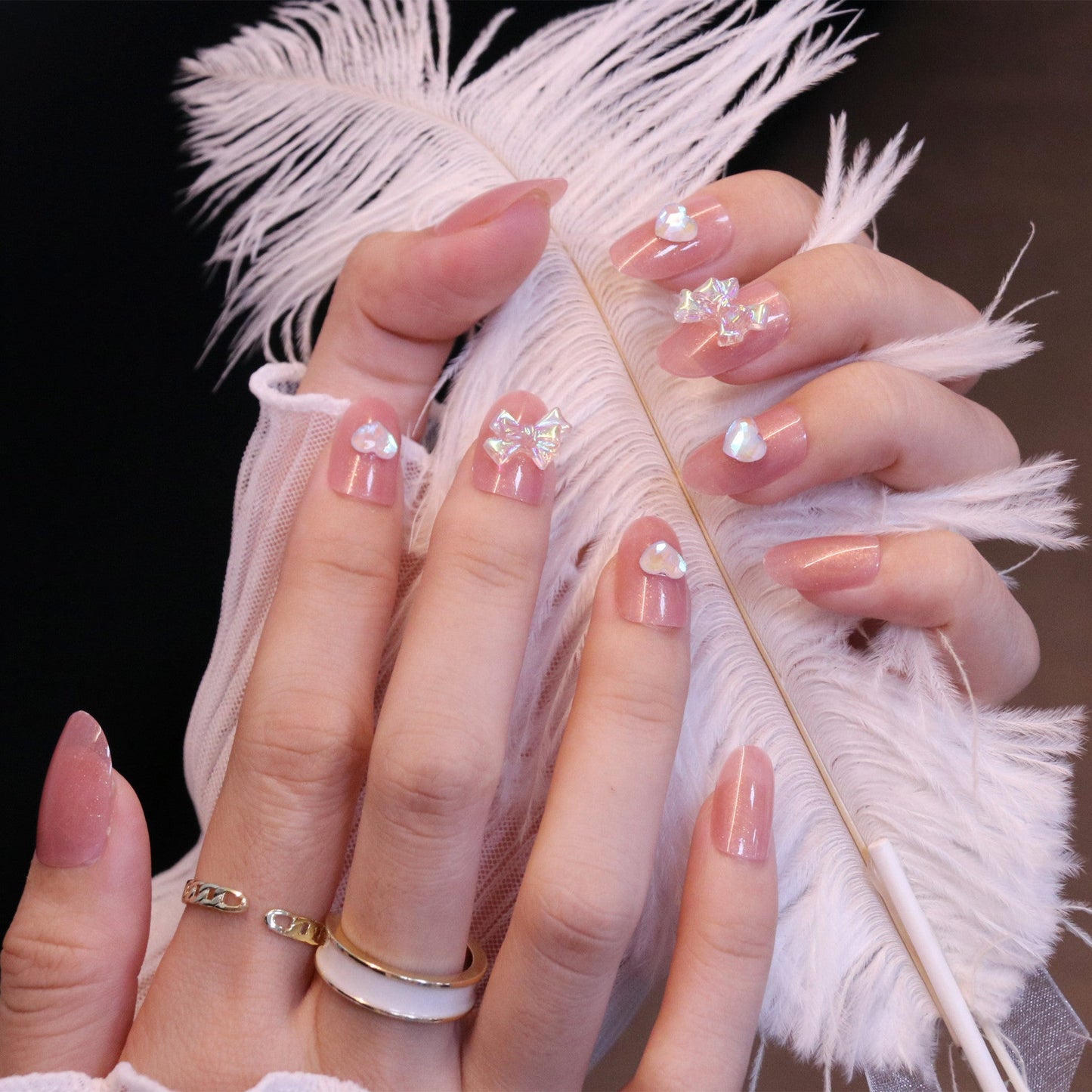 Medium Rounded Light Pink Press On Nails with Iridescent Bow and Heart