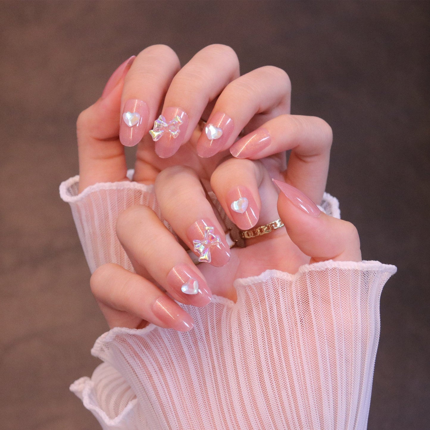 Medium Rounded Light Pink Press On Nails with Iridescent Bow and Heart