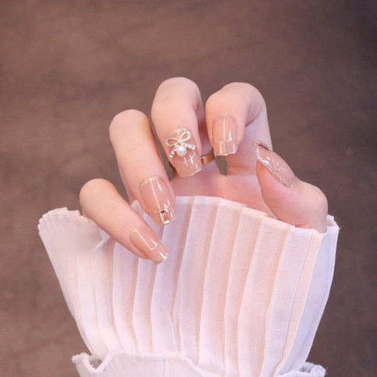 Medium Square Nude Press On Nails with Bow Charm and Pearl