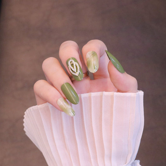 Long Almond Green Press On Nails with Geometric Crystal Charms