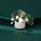 Plant-Filled Pouch Brooch with Crystals and Pearl