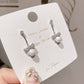 Pearl and Bow Silver Dangle Earring