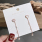 Rose Gold Heart Dangle Earrings